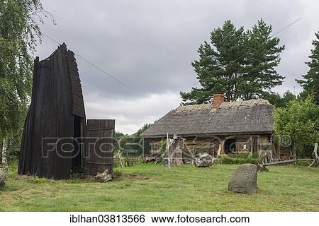 "House in an old fishing village and part of a wooden boat that serves as a smokehouse, open-air museum, Berģi, Riga, Riga pilseta, Latvia, Europe" View Large Photo Image Stock Photograph - "House in an old fishing village and part of a wooden boat that serves as a smokehouse, open-air museum, Berģi, Riga, Riga pilseta, Latvia, Europe". Fotosearch