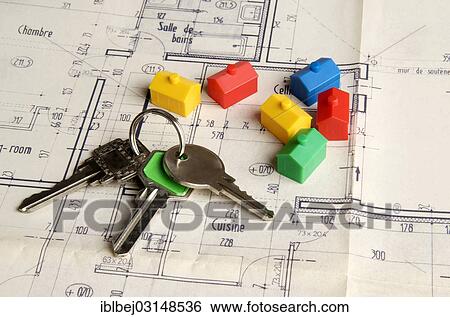 "House keys and miniature houses on a construction plan, symbolic image for real estate market, France, Europe" View Large Photo Image Stock Photograph - "House keys and miniature houses on a construction plan, symbolic image for real estate market, France, Europe". Fotosearch