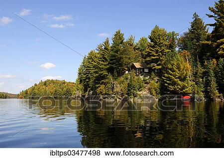 "House on a rock surrounded by woods, above Canoe Lake, Algonquin Provincial Park, Ontario Province, Canada, North America" View Large Photo Image Stock Photo - "House on a rock surrounded by woods, above Canoe Lake, Algonquin Provincial Park, Ontario Province, Canada, North America". Fotosearch