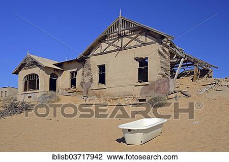 "House that has been filled by desert sand, in the former diamond city of Kolmanskuppe, now a ghost town, Kolmanskop, Karas Region, Namibia, Africa" View Large Photo Image Stock Image - "House that has been filled by desert sand, in the former diamond city of Kolmanskuppe, now a ghost town, Kolmanskop, Karas Region, Namibia, Africa". Fotosearch