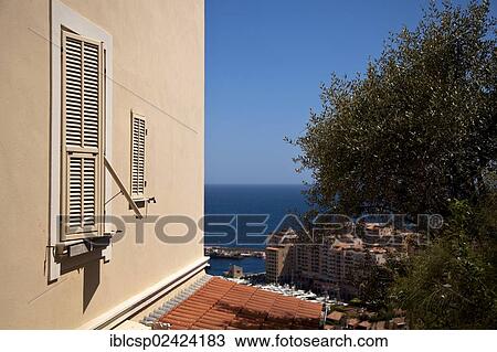 Stock Image - House wall, sea view, at Moneghetti district in Principality of Monaco, Europe. Fotosearch