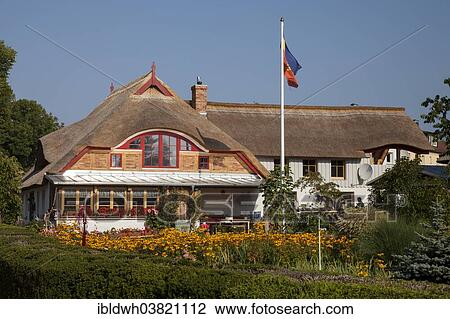"House with a thatched roof, Baltic Sea resort of Wustrow, Mecklenburg-Vorpommern, Germany, Europe" View Large Photo Image Stock Image - "House with a thatched roof, Baltic Sea resort of Wustrow, Mecklenburg-Vorpommern, Germany, Europe". Fotosearch