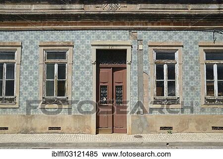"House with a typical tiled facade, Silves, Faro, Algarve, Portugal, Europe" View Large Photo Image Stock Photography - "House with a typical tiled facade, Silves, Faro, Algarve, Portugal, Europe". Fotosearch