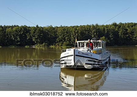 "Houseboat on the Canal des Vosges, formerly the Canal de l'Est, lock staircase with 15 locks at Golbey, Golbey, Epinal, Lorraine, Departement Vosges, France, Europe" View Large Photo Image Stock Image - "Houseboat on the Canal des Vosges, formerly the Canal de l'Est, lock staircase with 15 locks at Golbey, Golbey, Epinal, Lorraine, Departement Vosges, France, Europe". Fotosearch
