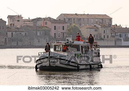 "Houseboat on the Canal du Midi, Castelnaudary, Region Languedoc-Roussillon, France, Europe" View Large Photo Image Stock Image - "Houseboat on the Canal du Midi, Castelnaudary, Region Languedoc-Roussillon, France, Europe". Fotosearch