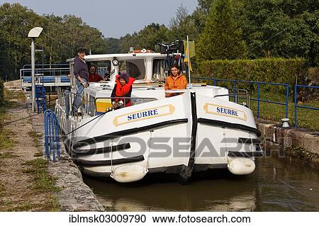 "Houseboat, ropes securing the boat whilst in the lock chamber, on the Canal des Vosges, formerly Canal de l'Est, at Pont-du-Bois, PK 136, Selles, Vesoul, Haute-Saone, Franche-Comte, France, Europe" View Large Photo Image Stock Image - "Houseboat, ropes securing the boat whilst in the lock chamber, on the Canal des Vosges, formerly Canal de l'Est, at Pont-du-Bois, PK 136, Selles, Vesoul, Haute-Saone, Franche-Comte, France, Europe". Fotosearch