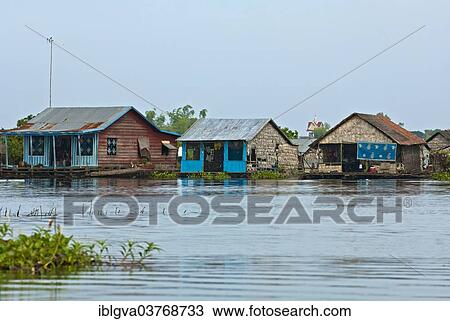 Stock Image - "Houseboats of a floating village on the Tonle Sap lake, near Siem Reap, Cambodia, Asia". Fotosearch