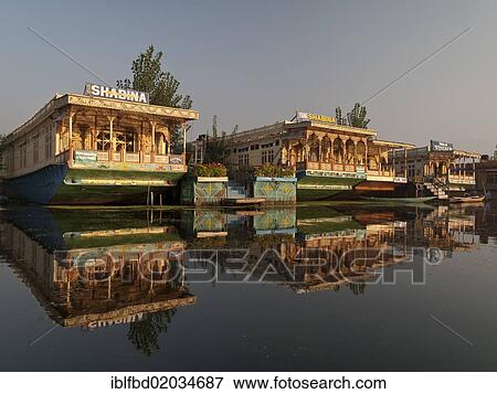 Stock Photo - "Houseboats on Dal Lake, popular to accomodate tourists, in Srinagar, Jammu and Kashmir, India, Asia". Fotosearch