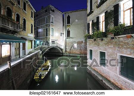Stock Photo - "Houses along a canal at night, Cannaregio, Venice, Venezia, Veneto, Italy, Europe". Fotosearch