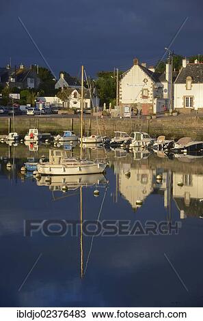 "Houses and boats reflected in the eastern harbor in the early morning, Port-Haliguen in Quiberon, southern Brittany, Bretagne, France, Europe" View Large Photo Image Stock Image - "Houses and boats reflected in the eastern harbor in the early morning, Port-Haliguen in Quiberon, southern Brittany, Bretagne, France, Europe". Fotosearch