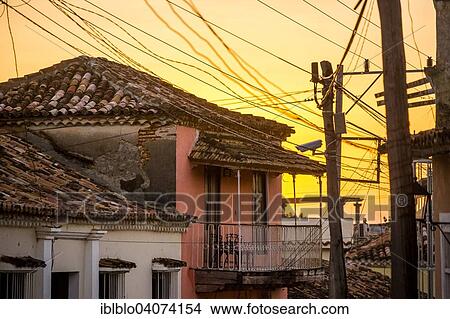 Picture - "Houses and electric power lines, Trinidad, Cuba, North America". Fotosearch