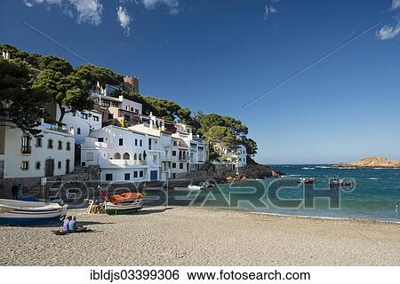 Stock Photograph - "Houses and fishing boats by the sea, Sa Tuna, Begur, Costa Brava, Catalonia, Spain, Europe". Fotosearch