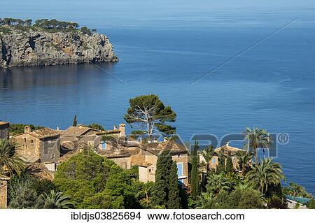 Picture - "Houses by the sea, Lluc Alcari, near Soller, Majorca, Balearic Islands, Spain, Europe". Fotosearch