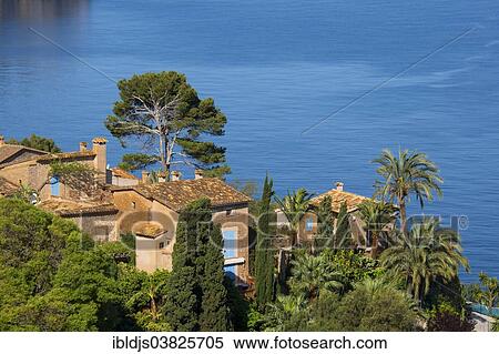 Stock Photography - "Houses by the sea, Lluc Alcari, near Soller, Majorca, Balearic Islands, Spain, Europe". Fotosearch