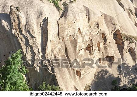 Stock Photo - "Houses digged in sandstone cliff, Zemi Valley, Goreme National Park, Unesco World Heritage Site, Cappadocia, Anatolia, Turkey, Asia". Fotosearch