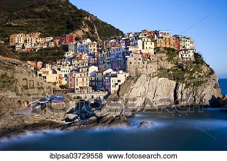 "Houses of Manarola on the rocky coast at dusk, UNESCO World Cultural Heritage Site, Manarola, Cinque Terre, Liguria, Italy, Europe" View Large Photo Image Stock Photo - "Houses of Manarola on the rocky coast at dusk, UNESCO World Cultural Heritage Site, Manarola, Cinque Terre, Liguria, Italy, Europe". Fotosearch