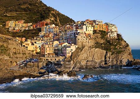 "Houses of Manarola on the rocky coast at dusk, UNESCO World Cultural Heritage Site, Manarola, Cinque Terre, Liguria, Italy, Europe" View Large Photo Image Stock Photo - "Houses of Manarola on the rocky coast at dusk, UNESCO World Cultural Heritage Site, Manarola, Cinque Terre, Liguria, Italy, Europe". Fotosearch
