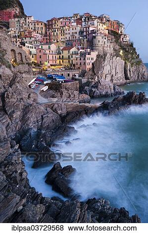 "Houses of Manarola on the rocky coast at dusk, UNESCO World Cultural Heritage Site, Manarola, Cinque Terre, Liguria, Italy, Europe" View Large Photo Image Stock Photo - "Houses of Manarola on the rocky coast at dusk, UNESCO World Cultural Heritage Site, Manarola, Cinque Terre, Liguria, Italy, Europe". Fotosearch