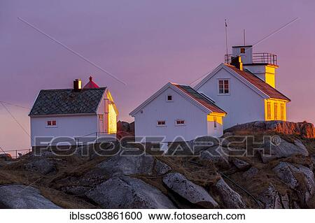 Stock Image - "Houses on the coast in the evening light, Austvagoy or Austvagoya, Lofoten, Norway, Europe". Fotosearch
