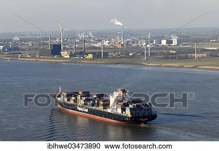 "Houston Express, Hapag-Lloyd container ship, on the Elbe River, Brunsbuettel nuclear power plant at back, Brunsbuttel, Schleswig-Holstein, Germany, Europe" View Large Photo Image Stock Image - "Houston Express, Hapag-Lloyd container ship, on the Elbe River, Brunsbuettel nuclear power plant at back, Brunsbuttel, Schleswig-Holstein, Germany, Europe". Fotosearch
