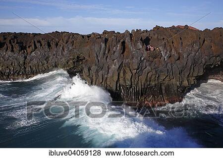 "Huge surf on the rocky coast of Los Hervideros, volcanic landscape, Lanzarote, Canary Islands, Spain, Europe" View Large Photo Image Stock Photo - "Huge surf on the rocky coast of Los Hervideros, volcanic landscape, Lanzarote, Canary Islands, Spain, Europe". Fotosearch