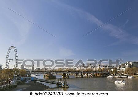 Stock Image - "Hungerford Bridge across the River Thames, London, London region, England, United Kingdom, Europe". Fotosearch