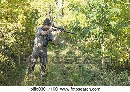 "Hunter waiting for game with weapon at the ready, Offheim, Limburg an der Lahn, Hesse, Germany, Europe" View Large Photo Image Stock Image - "Hunter waiting for game with weapon at the ready, Offheim, Limburg an der Lahn, Hesse, Germany, Europe". Fotosearch