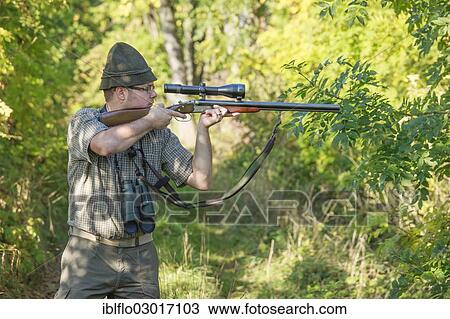 "Hunter waiting for game with weapon at the ready, Offheim, Limburg an der Lahn, Hesse, Germany, Europe" View Large Photo Image Stock Image - "Hunter waiting for game with weapon at the ready, Offheim, Limburg an der Lahn, Hesse, Germany, Europe". Fotosearch