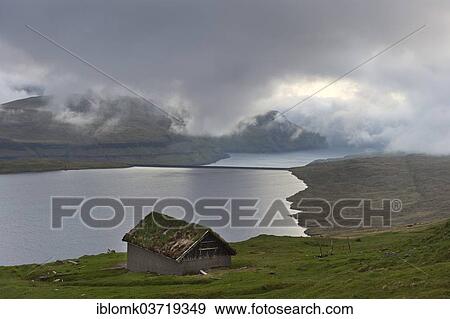 "Hut, low clouds, Eioi, Eysturoy, Faroe Islands, Denmark, Europe" View Large Photo Image Stock Photo - "Hut, low clouds, Eioi, Eysturoy, Faroe Islands, Denmark, Europe". Fotosearch