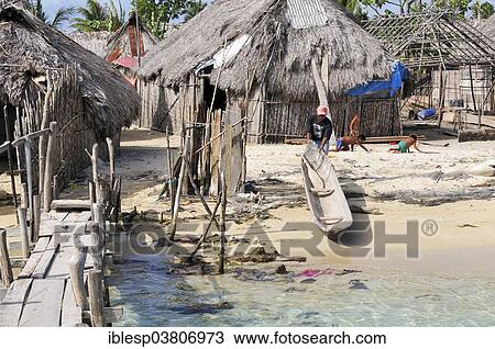 Stock Image - "Huts on the beach of Nalunega, a Kuna Indian village, San Blas Islands, Panama, North America". Fotosearch