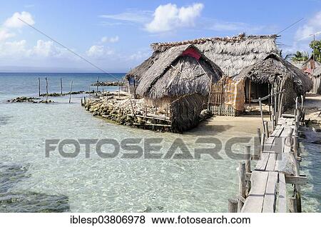 Stock Photo - "Huts on the beach, village of the Kuna people, Nalunega, San Blas Islands, Panama, Caribbean, North America". Fotosearch