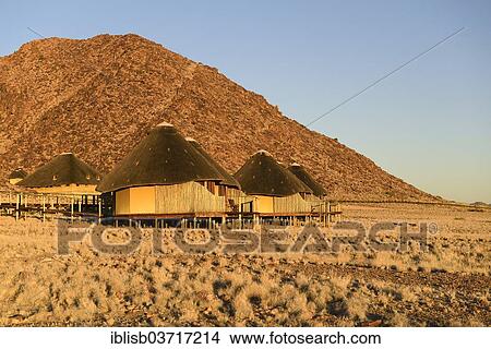 "Huts or lodges of the Sossus Dune Lodge Hotel in the evening light, Sossusvlei, Namib Desert, Namib Naukluft Park, Namibia, Africa" View Large Photo Image Picture - "Huts or lodges of the Sossus Dune Lodge Hotel in the evening light, Sossusvlei, Namib Desert, Namib Naukluft Park, Namibia, Africa". Fotosearch