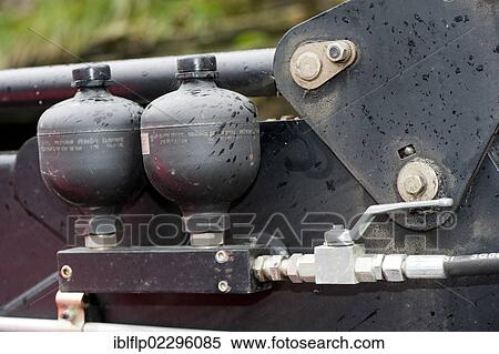 "Hydralic stabiliser, to help keep loader level when driving, England, United Kingdom, Europe" View Large Photo Image Stock Photography - "Hydralic stabiliser, to help keep loader level when driving, England, United Kingdom, Europe". Fotosearch