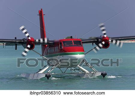 Stock Image - "Hydroplane, De Havilland Canada DHC-6 Twin Otter, frontal view, on water, Maldives, Asia". Fotosearch