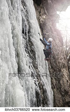 "Ice climber climbing a frozen waterfall, Alpbach, Alpbachtal valley, Reith im Alpbachtal, Tyrol, Austria, Europe" View Large Photo Image Stock Image - "Ice climber climbing a frozen waterfall, Alpbach, Alpbachtal valley, Reith im Alpbachtal, Tyrol, Austria, Europe". Fotosearch