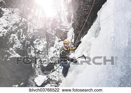 "Ice climber climbing a frozen waterfall, Alpbach, Alpbachtal valley, Reith im Alpbachtal, Tyrol, Austria, Europe" View Large Photo Image Stock Image - "Ice climber climbing a frozen waterfall, Alpbach, Alpbachtal valley, Reith im Alpbachtal, Tyrol, Austria, Europe". Fotosearch