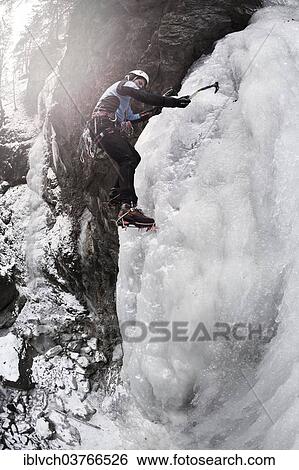 "Ice climber climbing a frozen waterfall, Alpbach, Alpbachtal valley, Reith im Alpbachtal, Tyrol, Austria, Europe" View Large Photo Image Stock Photograph - "Ice climber climbing a frozen waterfall, Alpbach, Alpbachtal valley, Reith im Alpbachtal, Tyrol, Austria, Europe". Fotosearch