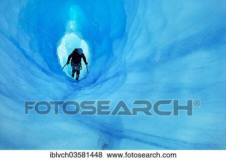 Stock Photo - "Ice climbing in an ice cave or glacier cave, Grey Glacier, Torres del Paine National Park, Chile, South America". Fotosearch