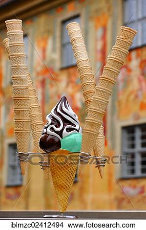 Ice cream cones in a stand, in the rear fresco paintings at the old town hall, Bamberg, Upper Franconia, Bavaria, Germany, Europe, PublicGround, Europe View Large Photo Image Picture - Ice cream cones in a stand, in the rear fresco paintings at the old town hall, Bamberg, Upper Franconia, Bavaria, Germany, Europe, PublicGround, Europe. Fotosearch