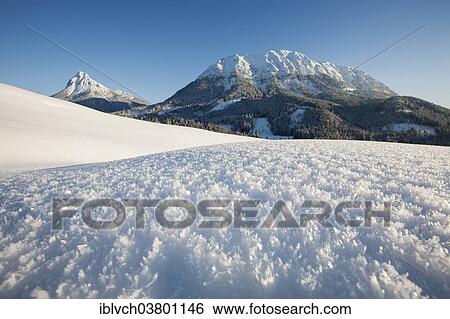 "Ice crystals in a winter landscape, Mt Guffert, rear left, and Mt Vorderunnutz, right, Achental Valley, Achenkirch, North Tyrol, Austria, Europe" View Large Photo Image Stock Photograph - "Ice crystals in a winter landscape, Mt Guffert, rear left, and Mt Vorderunnutz, right, Achental Valley, Achenkirch, North Tyrol, Austria, Europe". Fotosearch