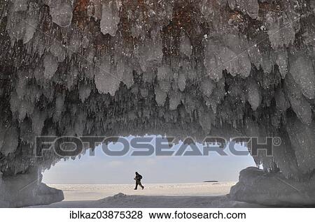 Ice Formations And Icicles Hanging From Ceiling In A Cave