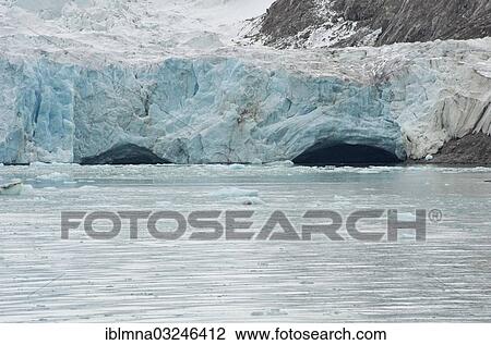 Stock Image - "Ice portal in Smeerenburg Glacier, Smeerenburgfjorden, Spitsbergen Island, Svalbard Archipelago, Svalbard and Jan Mayen, Norway, Europe". Fotosearch