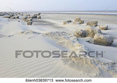 Stock Image - "Ice structures on the beach, Langeoog, East Frisia, Lower Saxony, Germany, Europe". Fotosearch