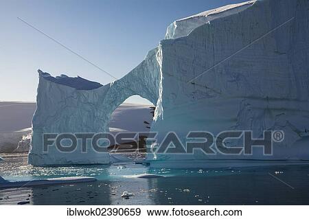 "Iceberg archway in Lemaire Channel, Antarctic Peninsula, Antarctica" View Large Photo Image Stock Photo - "Iceberg archway in Lemaire Channel, Antarctic Peninsula, Antarctica". Fotosearch
