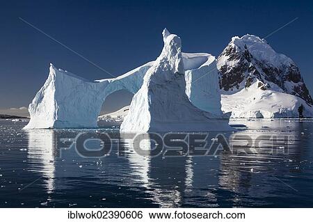"Iceberg archway in Lemaire Channel, Antarctic Peninsula, Antarctica" View Large Photo Image Stock Photograph - "Iceberg archway in Lemaire Channel, Antarctic Peninsula, Antarctica". Fotosearch