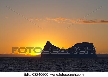 "Iceberg at sunset, with backlighting, bei Ittoqqortoormiit, Scoresbysund, Sermersooq, Greenland, North America" View Large Photo Image Stock Image - "Iceberg at sunset, with backlighting, bei Ittoqqortoormiit, Scoresbysund, Sermersooq, Greenland, North America". Fotosearch
