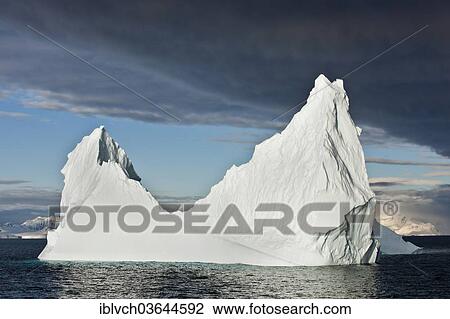 "Iceberg in the morning light, Antarctic Peninsula, Antarctica" View Large Photo Image Stock Image - "Iceberg in the morning light, Antarctic Peninsula, Antarctica". Fotosearch