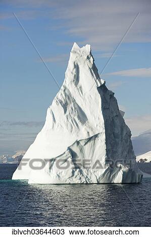 Stock Image - "Iceberg in the morning light, Antarctic Peninsula, Antarctica". Fotosearch