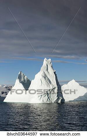 Stock Photo - "Icebergs in the morning light, Antarctic Peninsula, Antarctica". Fotosearch