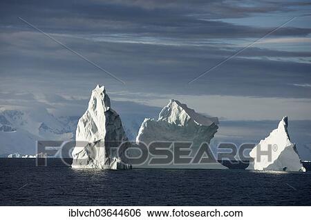 Stock Photograph - "Icebergs in the morning light, Antarctic Peninsula, Antarctica". Fotosearch